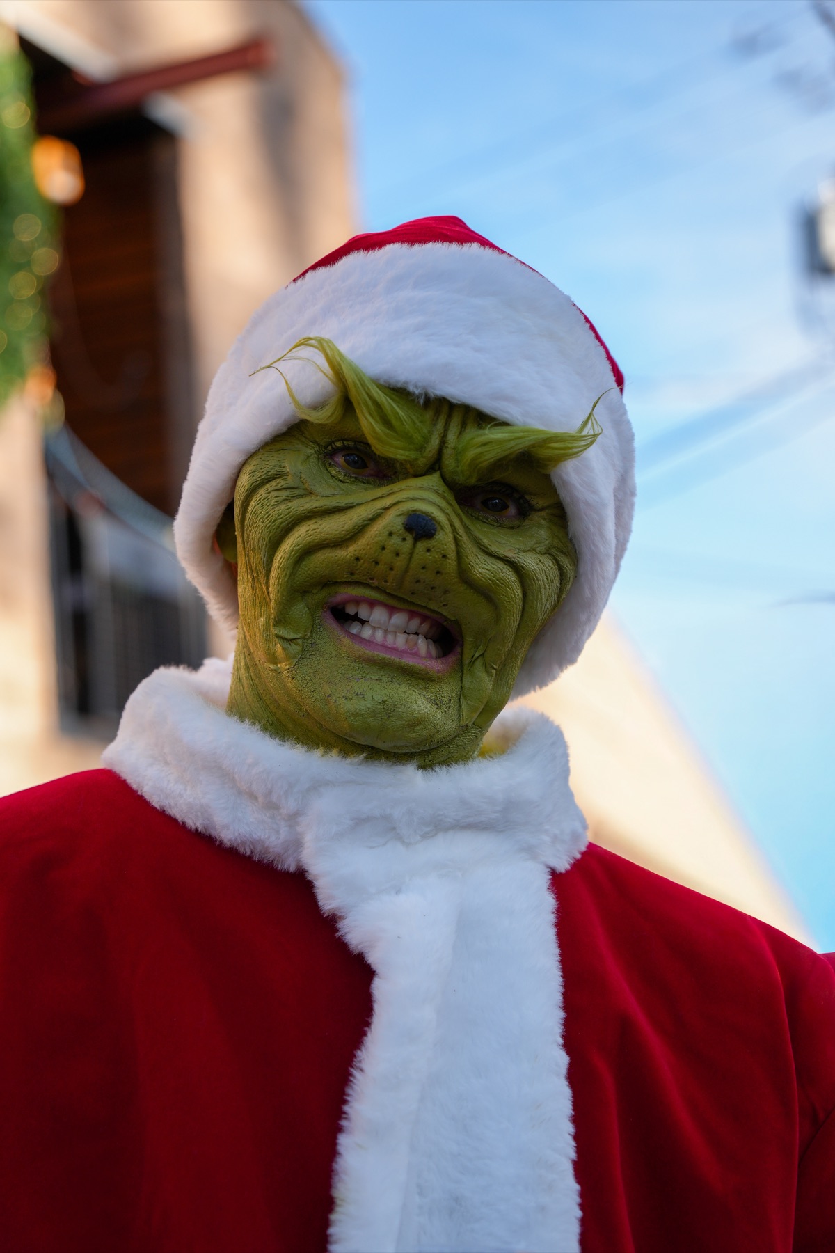 Christmas parade float glowing through downtown