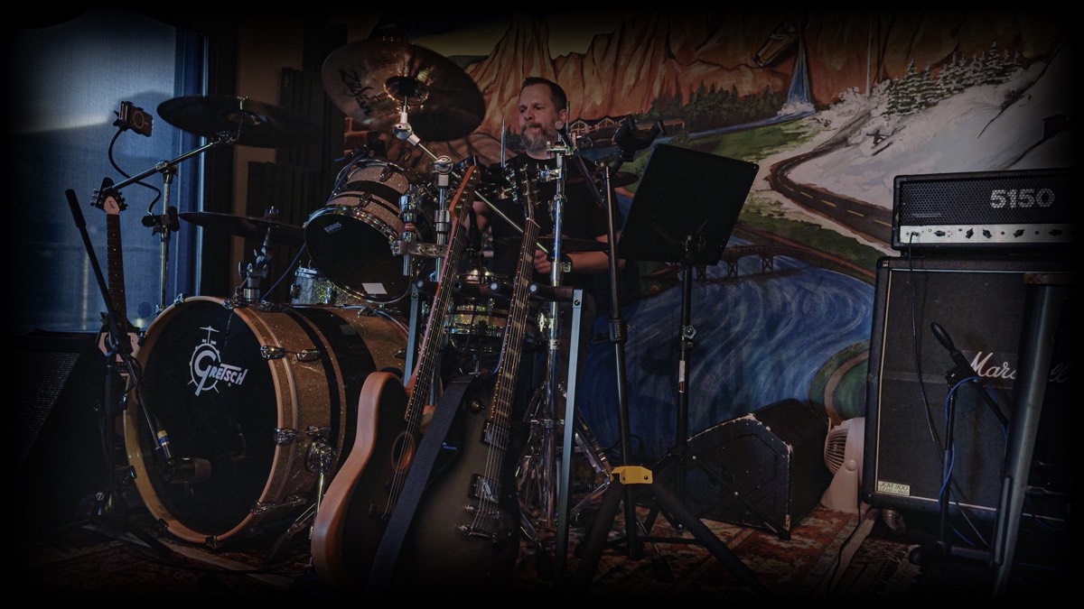 Greg from That 90s Band during a colorful soundcheck